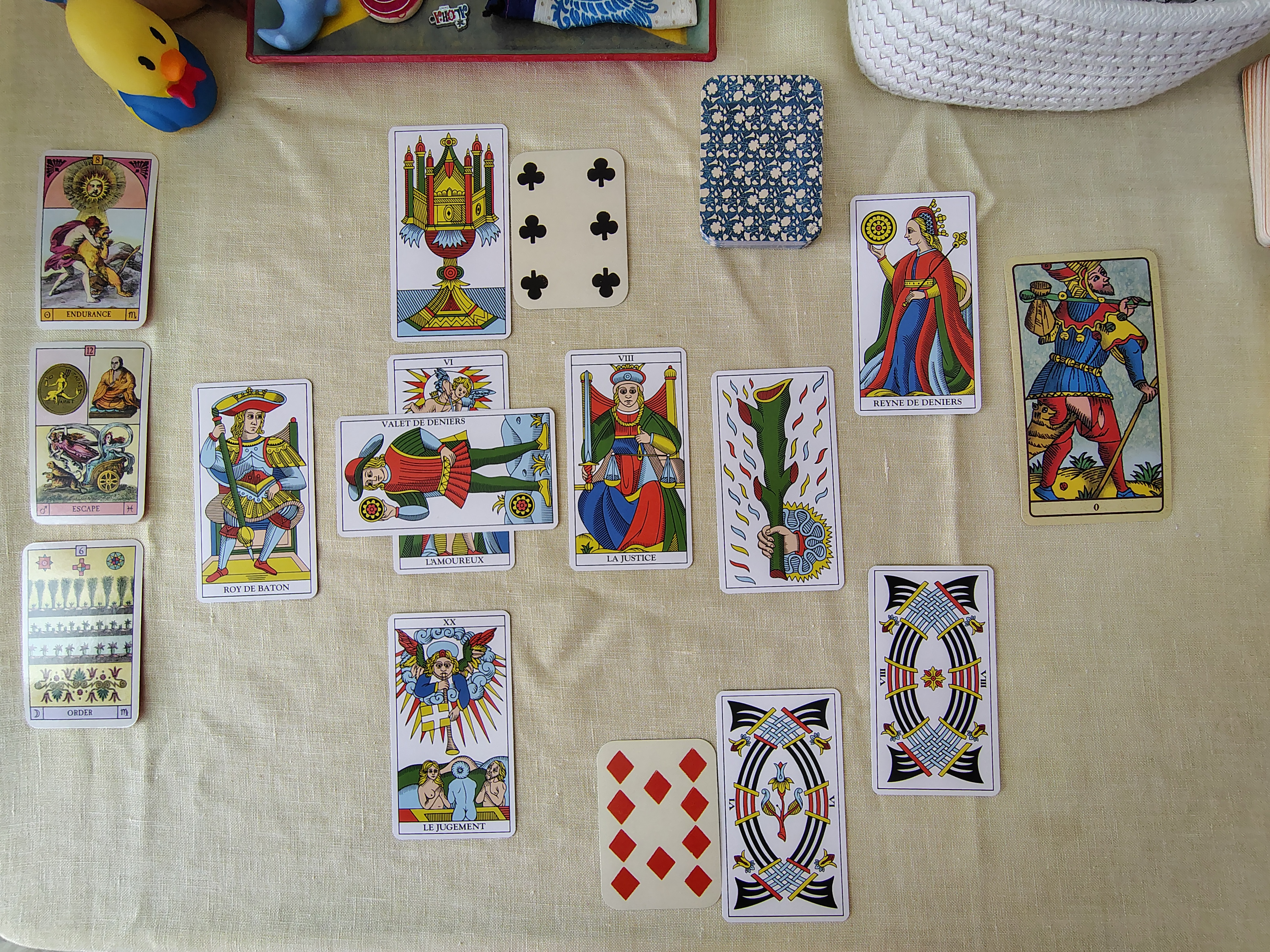 Celtic Cross spread with Oracle cards and Playing cards.